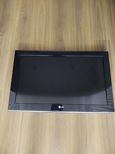 ТВ и видео: LG plazma televizor. Qara rəngli, geniş ekranlı modeldir. Ön hissədə — 4