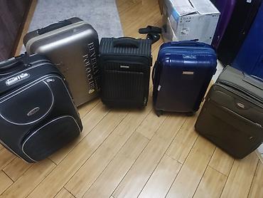 Чемоданы: Чемодан, Материал: Пластик, Большой (более 70 л), На колесах — 5