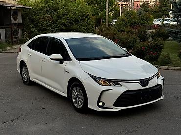 мес лупарик: Toyota Corolla: 2022 г., 1.8 л, Вариатор, Гибрид, Седан — 2