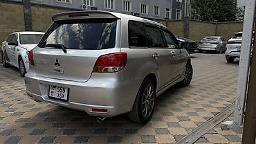 митсубиси аиртек: Mitsubishi Airtrek: 2001 г., 2 л, Автомат, Бензин, Универсал — 4