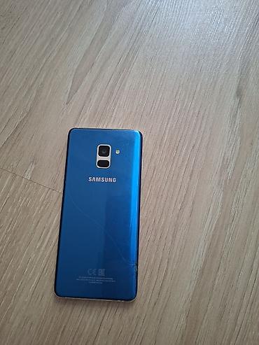телефон fly fs520 selfie 1: Samsung Galaxy A8 2018, цвет - Голубой, Две SIM карты — 2