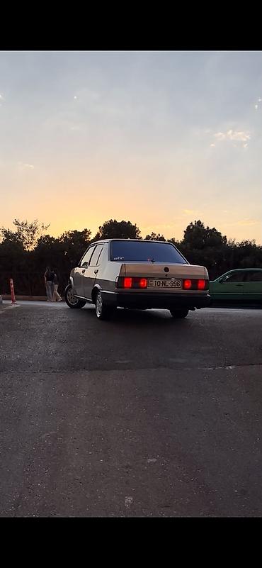 cankan masin: Model: Tofaş Dogan sedan Rəng: Gümüşü/boz, qara bamper və qoruyucu — 3