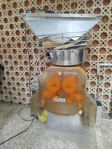 Restoran, kafe avadanlığı: Zumex sənaye tipli portağal sıxan aparat. 20 klo çəkisi var. qiyməti — 1