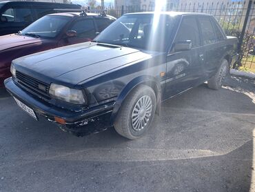 машина балыкчы: Nissan Bluebird: 1986 г., 2 л, Механика, Бензин, Седан