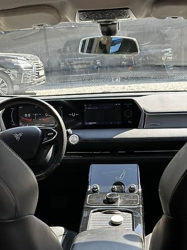jeely coolray: Электромобиль Skyworth Skyworth EV (бренд-логотип на кузове), белый — 8