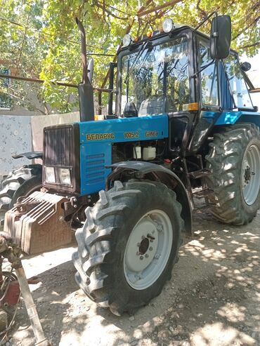 kend teserrufati texnikalari: Mavi rəngli Belarus 1025.2 markalı traktor kənd təsərrüfatı və digər