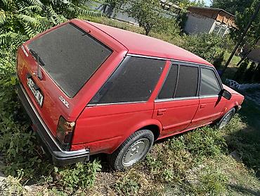 e6 3: Nissan Bluebird: 1986 г., 1.8 л, Механика, Бензин, Универсал — 6