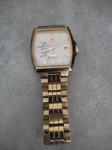 шорты оригинал: ORIENT JAPAN оригинальные часы с сама заводом,есть мелкие царапины на