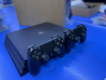 купить приставку игровую: Продаю PRO прошитая +22топ игр Память 1000гиг, в идеальном состоянии