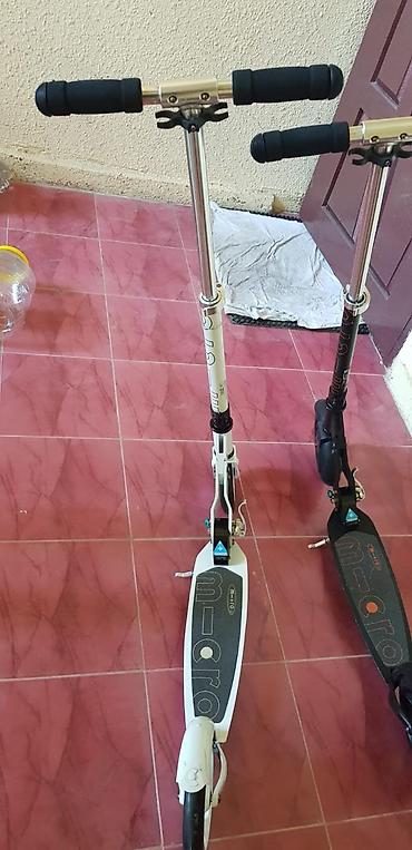 teker kompressoru: Məhsul: Micro markalı şehər skuterləri (iki rəng: qara və ağ) — 3
