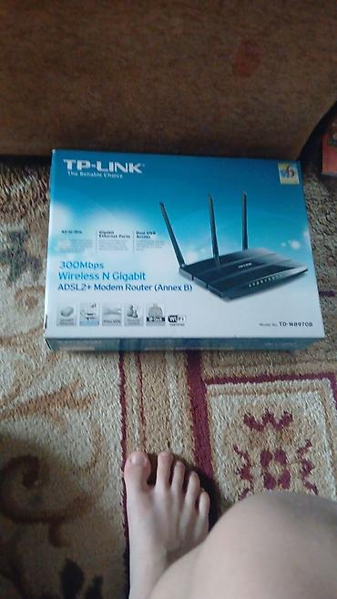 mifi router: TP-Link TD-W8970B – 300Mbps Wireless N Gigabit ADSL2+ Modem Router — 1