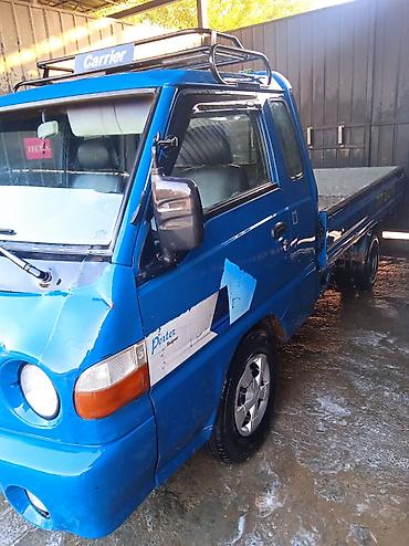 держатель парктроника: Hyundai Porter Super, бортовой грузовик с удлинённой платформой — 2