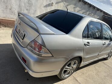 Mitsubishi: Mitsubishi Lancer: 2004 г., 2 л, Механика, Бензин, Седан