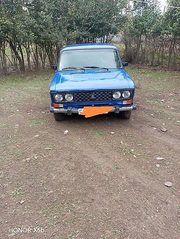 canqan uni z: VAZ 2106, mavi rəng. Klassik sedan gövdə, xrom ön barmaqlıq və dəyirmi — 4