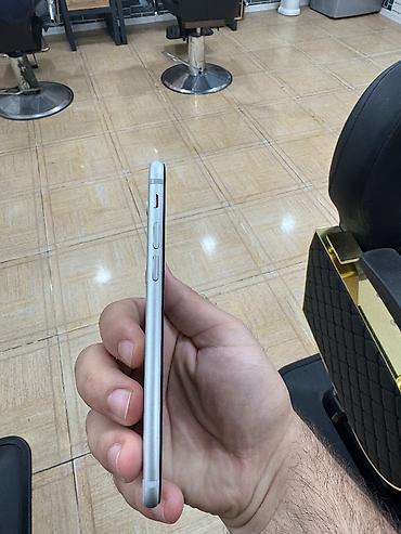 ikinciel iphone: IPhone 7, 32 GB, Natural Titanium, Barmaq izi — 3