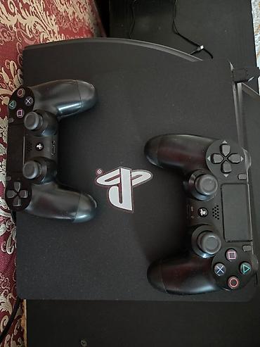 ps pultu: Ps 4 slim 1 tr.tam ela veziyyetde,iki arijinal pult.prasifkali icinde — 3