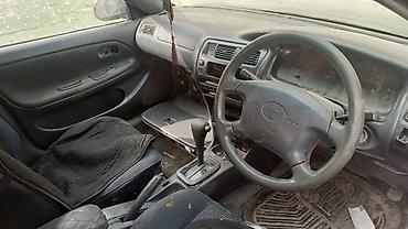 Toyota: Toyota Corolla: 1999 г. — 3