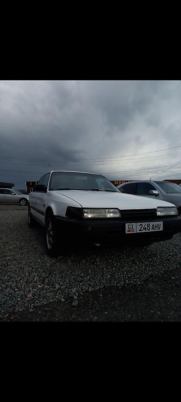вампер 124: Mazda 626: 1994 г., 2 л, Механика, Бензин, Седан — 2