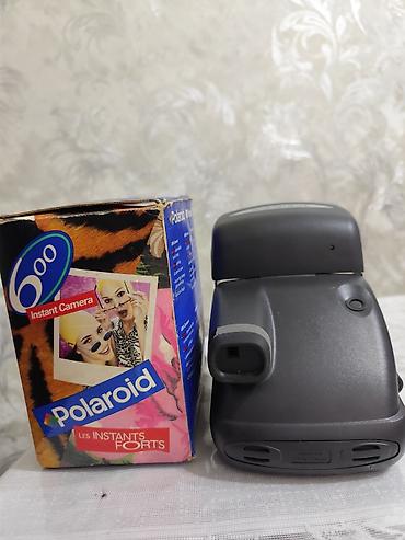 kamera polaroid: Polaroid 600 markalı ani çap edilmiş şəkil çapı üçün foto kamera. 10 — 3