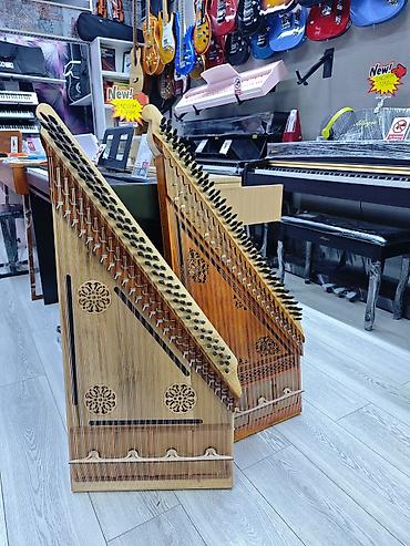 Musiqi alətləri: Kanon musiqi aləti Kanon, Qanun Kanon musiqi aləti Üzerinde — 2