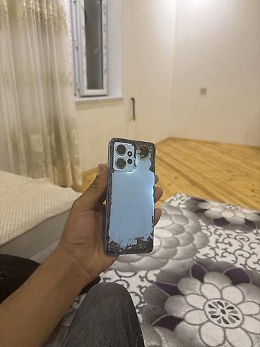 telefon ucun qulaqciqlar: Redmi 12, 128 GB, rəng - Göy, Barmaq izi, Qırıq, Sensor — 1