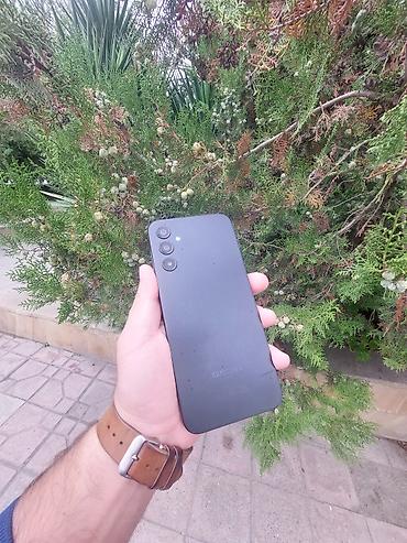 irsad electronics samsung a10: Samsung Galaxy A14, 64 GB, rəng - Qara, Zəmanət, Sensor, Barmaq izi — 1