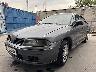 харизма: Mitsubishi Carisma: 2003 г., Седан — 3