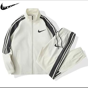 nike кофта: Спортивный костюм Nike, черный с серо‑графитовыми лампасами. есть — 2