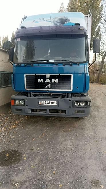 шина kg: Грузовой автомобиль MAN с крупнообъёмным закрытым — 4