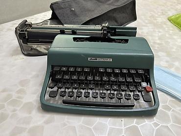 печатный: Портативная печатная машинка Olivetti Lettera 32 - Классическая — 2