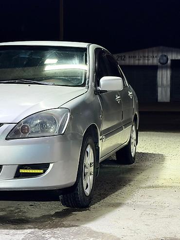 выхлопы: Mitsubishi Lancer: 2004 г., 1.6 л, Автомат, Бензин, Седан — 5