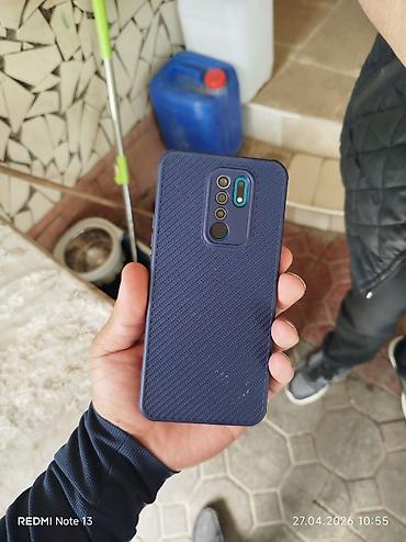 islenmis plansetlerin satisi: Xiaomi Mi 9, 32 GB, rəng - Göy, 
 Barmaq izi — 3