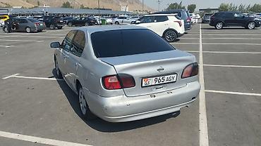 r13 17570: Nissan Primera: 2000 г., 2 л, Механика, Бензин, Седан — 4
