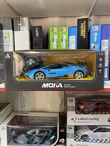 автомобильная рация: Радиоуправляемая модель спортивного автомобиля MOIA - Масштаб: 1:12 - — 1