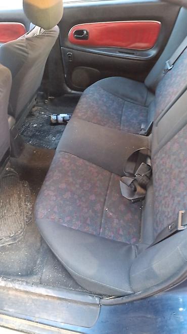 Mazda: Mazda 323: 1.5 l | 1996 г. Hečbek — 6