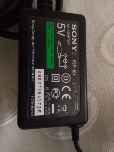 en ucuz oyun konsolu: Sony psp adaptoru arikinaldi