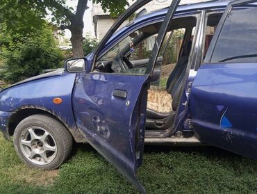 тайота сервы: Mazda 121: 1994 г., 1.6 л, Механика, Бензин, Седан