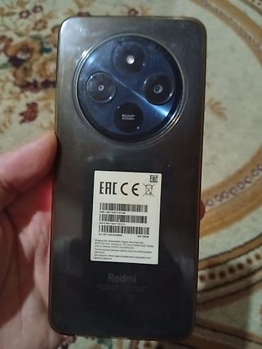 qaqa profil şəkilləri: Redmi smartfon - Arxa tərəf: dairəvi modulda 50 MP “2.0µm” əsas — 1