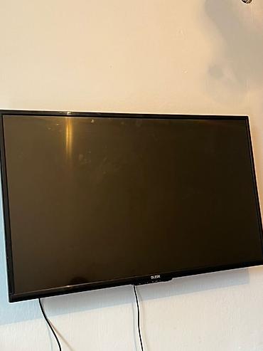 core 2: Телевизор BLESK, диагональ около 40–43". Тонкая рамка, плоская панель — 3