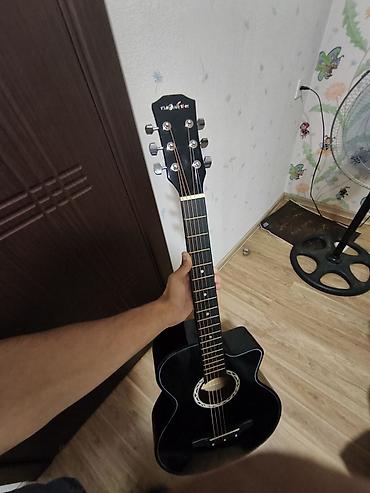 ucuz gitara: Gitar satılır almışam heç istifadə edilməyib aşağı hissədə balaca bir — 1