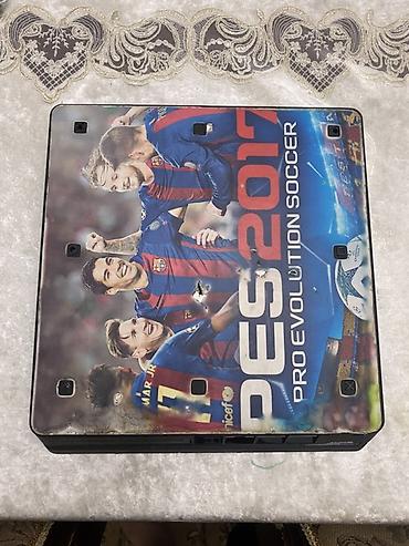 пле: Игровая консоль Sony PlayStation 4 Slim (чёрная) - Форм‑фактор — 2