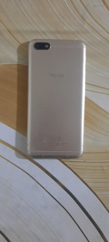 telefon yeni: Honor 7A, 16 GB, rəng - Qızılı, İki sim kartlı, Face ID, Zəmanət