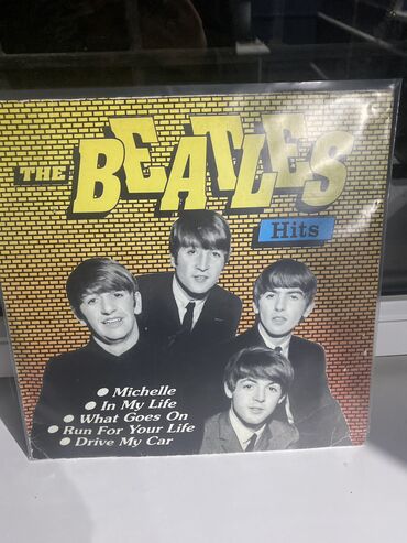 виниловые пластинки: Виниловая пластинка группы The Beatles