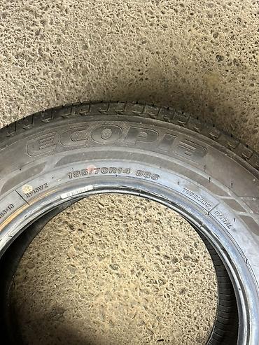 385 55: Шина Bridgestone Ecopia EP15 - Размер: 185/70 R14 - Индекс — 4