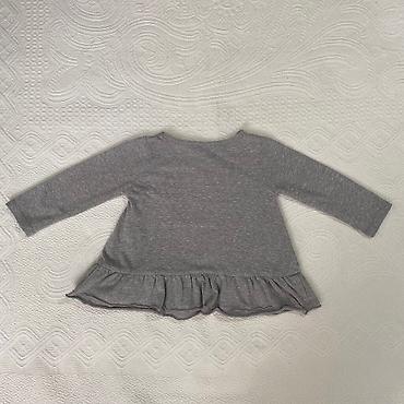 tn kids: Bluza-tunika za bebe
Nije puno nosena,u ok stanju
Velicina 12 mes — 4