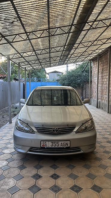 Toyota Camry: 2006 г., 2.4 л, Автомат, Газ, Седан