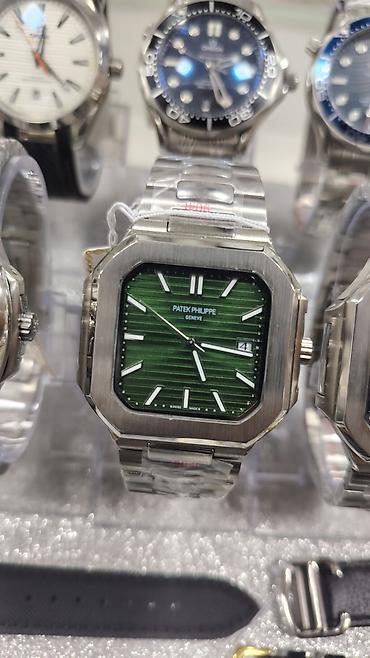 bakida saat: Patek Philippe Nautilus üslubunda kişi saatları – polad korpus və — 1