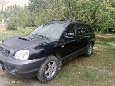 продаю хундай: Hyundai Santa Fe, черный кроссовер (первое поколение)2 объем дизель