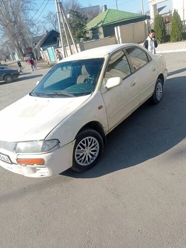 машина маленкий: Mazda 323: 1995 г., 1.5 л, Автомат, Бензин, Седан