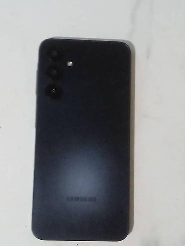 samsung flip: Смартфон Samsung (черный) - Экран с каплевидным вырезом под — 2